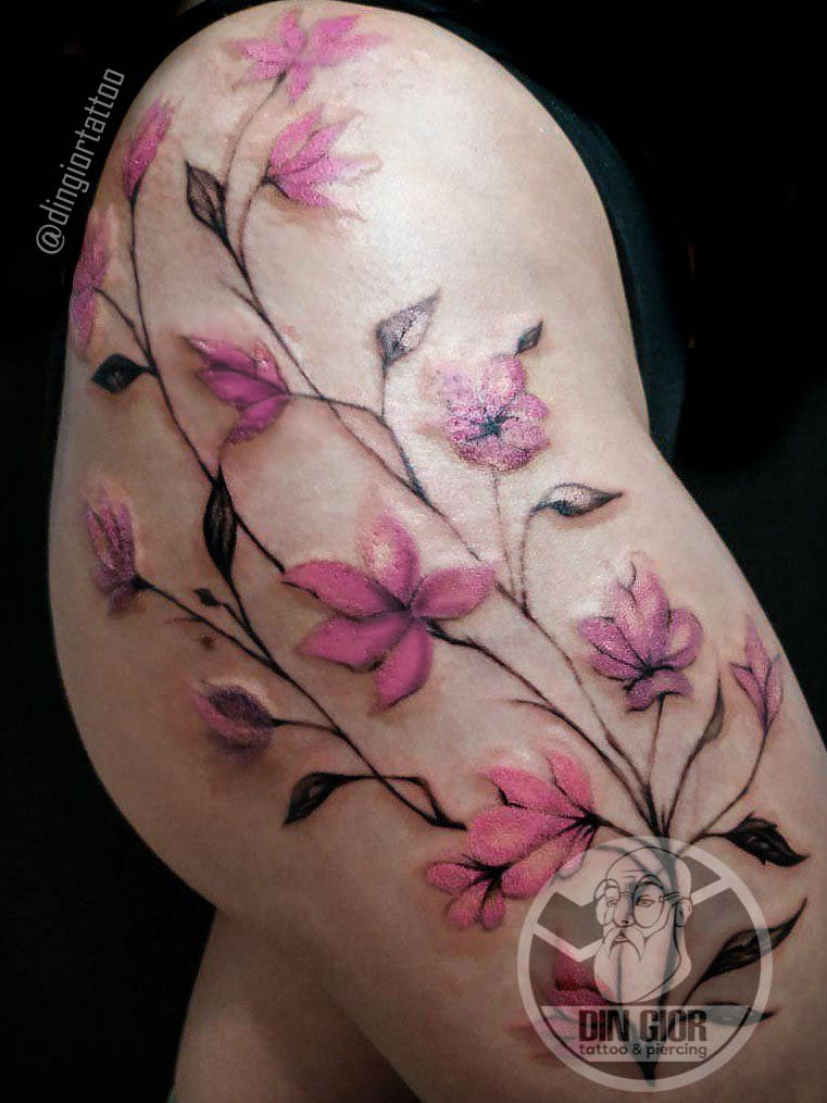Color Tattoo Flowers on the Hip