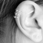 white ring ear piercing