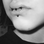 black mouth piercing