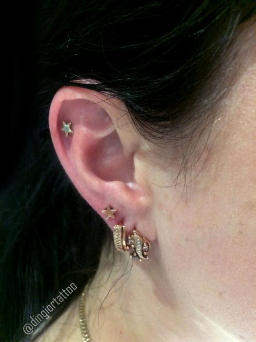 piercing conch and lobe